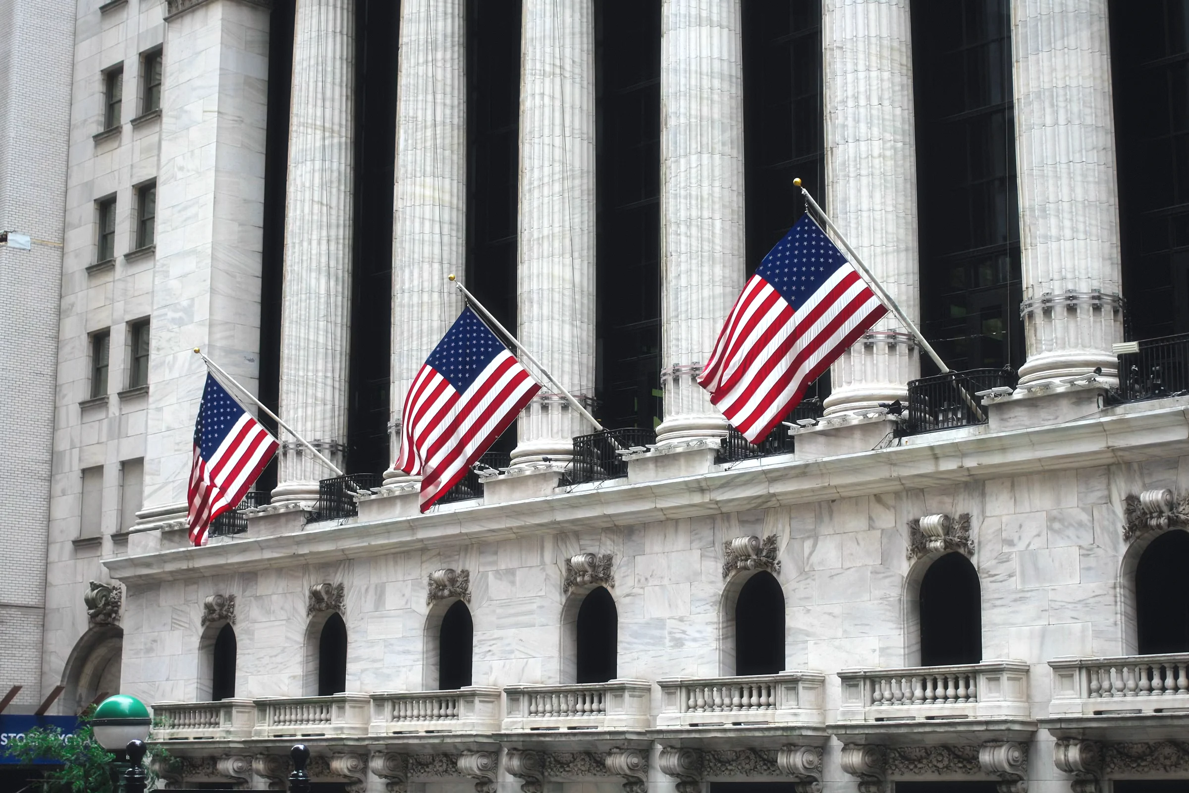 Financial district building facade with flags